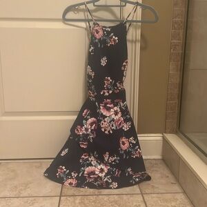 Floral dress cross straps in the back.